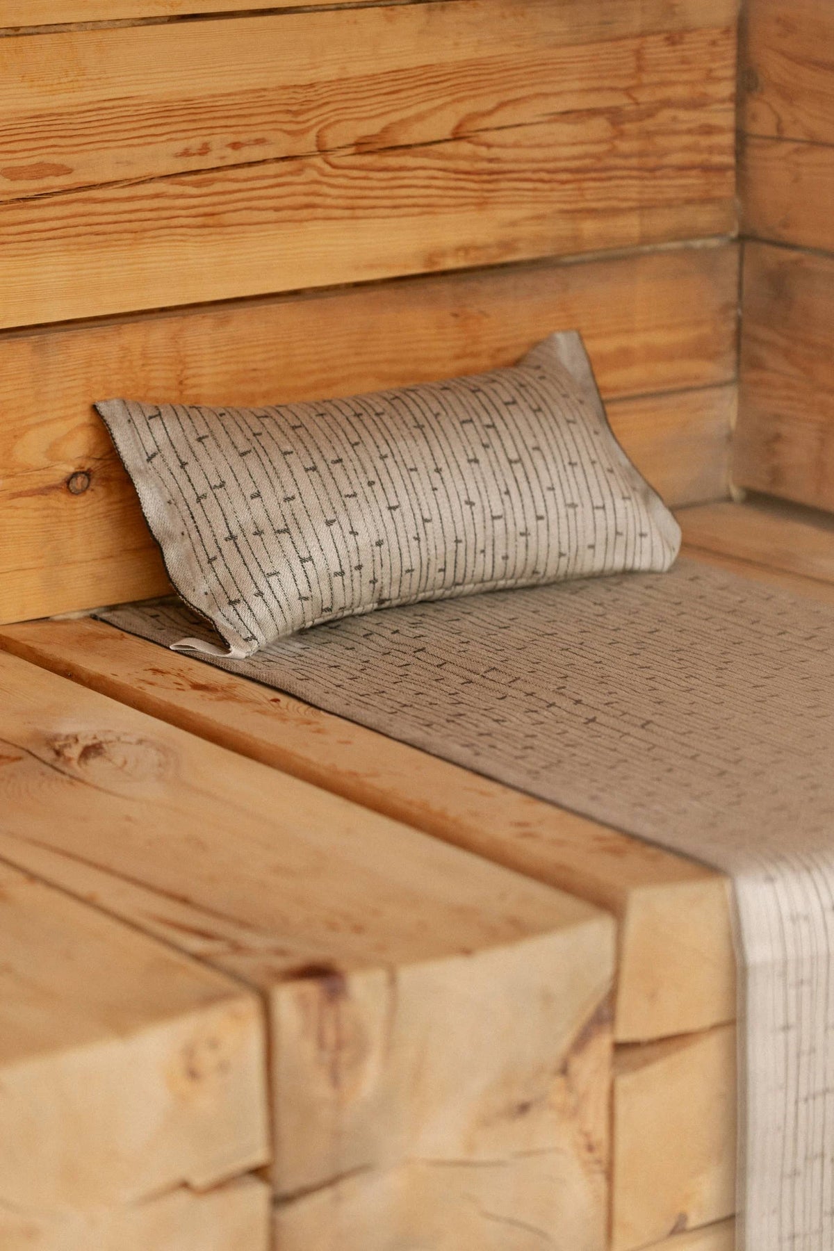 Metsä Sauna Pillow in a sauna